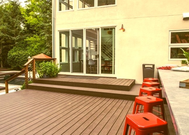 A small, modern outdoor kitchen deck with no cover is an example.